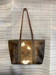 Cowhide with Leather Strap